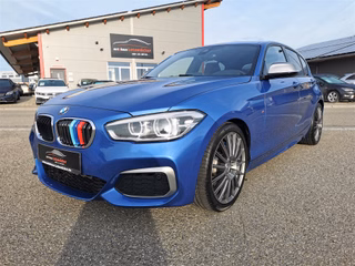 BMW M140i 2.HAND|NAVI|KEYLESS|LED|SCHIEBEDA|H&K Used vehicle for sale | First registration 04/2017 | Price 27.990 €