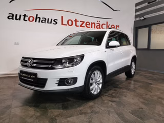 Volkswagen 1.4 TSI Tiguan Sport & Style BMT 1.HAND/NAVI/AHK/PDC/PARK-ASSIST Used vehicle for sale | First registration 04/2014 | Price 15.300 €