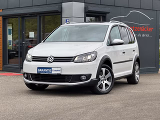 Volkswagen 1,4 TSI Cross Touran 7-Sitz,Pano,Autom,Navi,Xen,SH Used vehicle for sale | First registration 06/2013 | Price 15.490 €