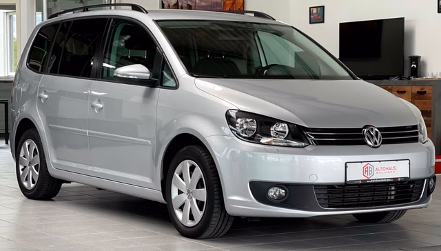 Volkswagen Touran TSI Comfortline 1.HAND|SHZ|NAVI|PDC|TEMPOMAT Gebrauchtwagen Kaufen | EZ 08/2013 | Preis 9.990 €